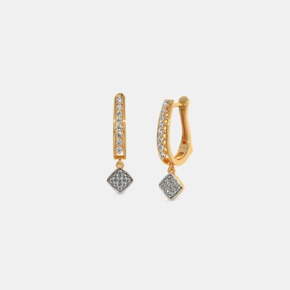 The Surahi Huggie Earrings